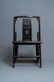 A pair of Chinese carved wooden chairs with wicker seats, 19th C.