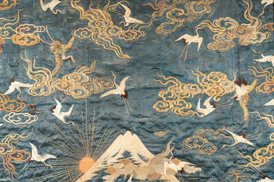 A large Japanese silk embroidery with Mount Fuji, cranes and carps, Meiji, 19th C.