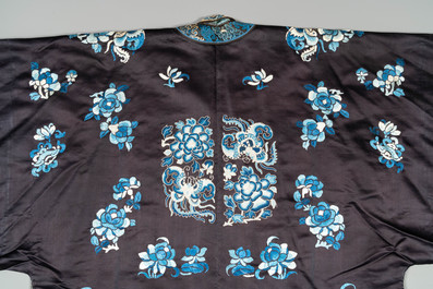 A Chinese 'forbidden stitch' embroidered silk ladies robe with flowers and butterflies, 19th C.