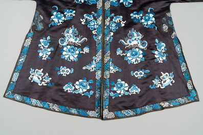 A Chinese 'forbidden stitch' embroidered silk ladies robe with flowers and butterflies, 19th C.