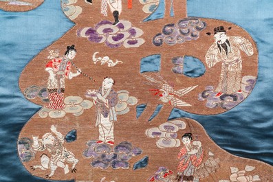 A Chinese embroidered silk 'Shou' panel with immortals, 19th C.