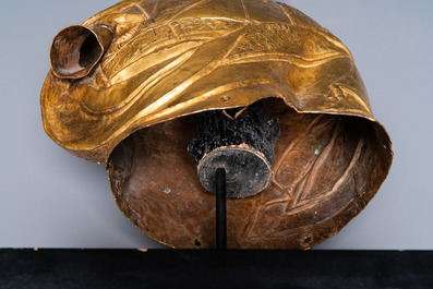 A Tibetan partly gilded brass bust of a Buddhist monk, 18th C.