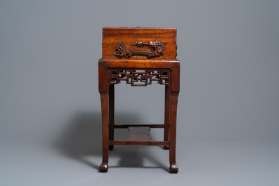 A Chinese wooden casket on stand, 19/20th C.