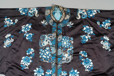 A Chinese 'forbidden stitch' embroidered silk ladies robe with flowers and butterflies, 19th C.