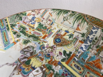 A large Chinese Canton famille rose 'horseriders' dish, 19th C.