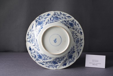 A Chinese blue and white gadrooned dish with phoenixes and monkeys, Kangxi