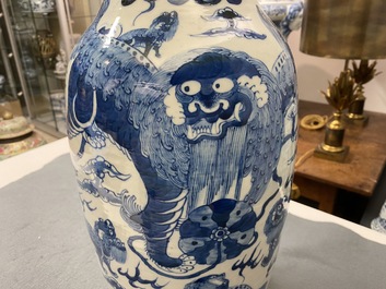 Three Chinese blue and white and celadon-ground 'Buddhist lion' vases, 19th C.