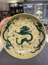 A Chinese yellow-ground famille verte 'dragon' dish, probably Qianlong