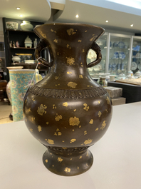 A Chinese gilt-splashed bronze vase, Qianlong mark, Qing