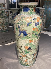 Une paire de vases en porcelaine de Chine famille verte &agrave; d&eacute;cor d'animaux mythiques, Kangxi