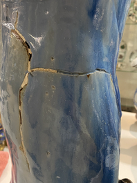 A large Chinese blue-glazed Shiwan pottery 'immortal' figure, 19th C.