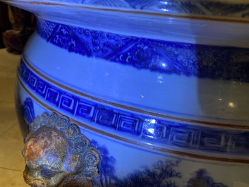 A large Chinese blue and white fish bowl with landscape design, Qianlong