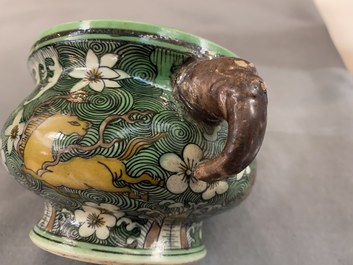 A Chinese verte biscuit 'flaming horses' censer, Jiajing mark, 18/19th C.