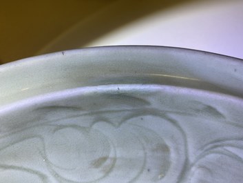 Two Chinese Longquan celadon dishes with underglaze design, Ming