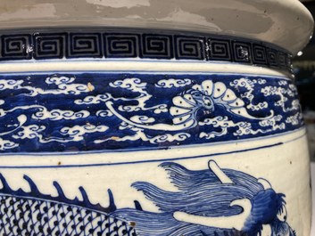 A Chinese blue and white 'dragons' fish bowl, Qianlong/Jiaqing