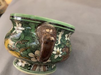 A Chinese verte biscuit 'flaming horses' censer, Jiajing mark, 18/19th C.