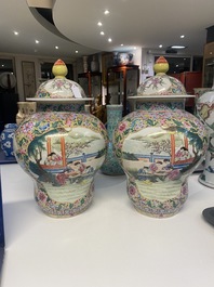 A pair of Chinese famille rose yellow-ground vases and covers, Qianlong mark, Republic