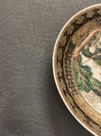 A Chinese famille rose 'harvesting' cup and saucer, Yongzheng