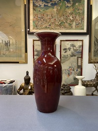 A Chinese monochrome sang de boeuf bottle vase, 19/20th C.