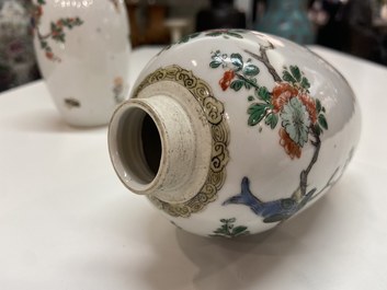 A pair of Chinese famille verte jars with birds among blossoming branches, Kangxi