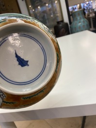 A Chinese verte biscuit bowl on wooden stand, 19th C.