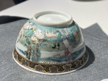 A Chinese famille rose 'harvesting' cup and saucer, Yongzheng