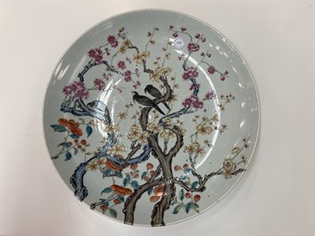 A large Chinese famille rose 'prunus and magpie' dish, Qianlong mark, 19th C.