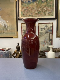 A Chinese monochrome sang de boeuf bottle vase, 19/20th C.