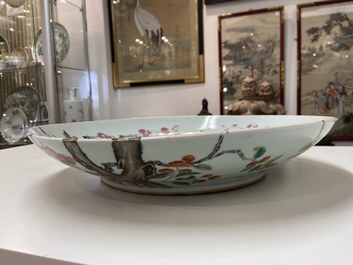 A large Chinese famille rose 'prunus and magpie' dish, Qianlong mark, 19th C.