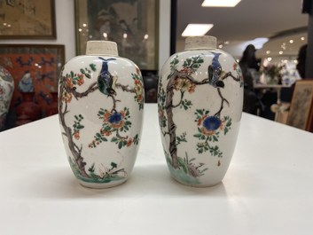 A pair of Chinese famille verte jars with birds among blossoming branches, Kangxi