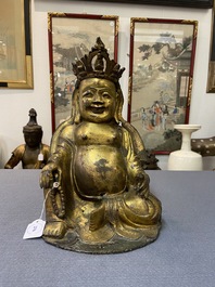 Une figure de Bouddha assis en bronze dor&eacute;, Chine, Ming