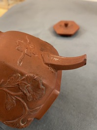 Four Chinese Yixing stoneware, blue and white and monochrome black porcelain teapots, Kangxi and later