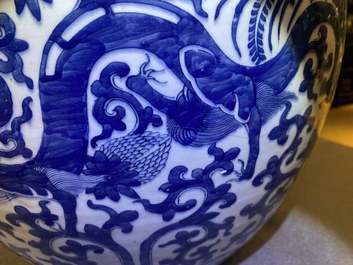 A Chinese blue and white 'dragons' fish bowl, 19th C.