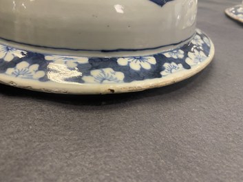 A pair of large Chinese blue and white covered vases, 19th C.