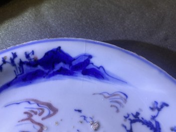 Two Chinese blue, white and copper-red 'fish' plates, Transitional period