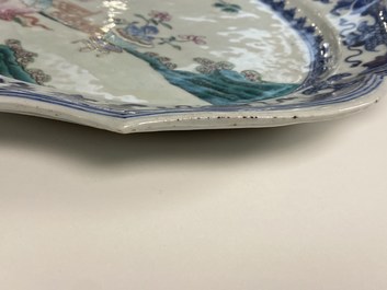 A pair of Chinese oval famille rose dishes with a lady in a garden, Qianlong