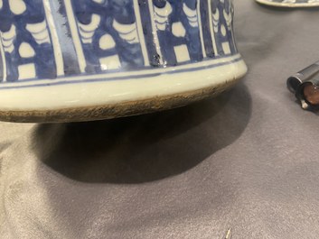 A pair of large Chinese blue and white covered vases, 19th C.