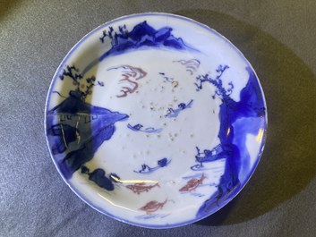 Two Chinese blue, white and copper-red 'fish' plates, Transitional period