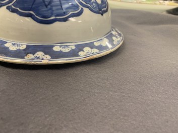 A pair of large Chinese blue and white covered vases, 19th C.