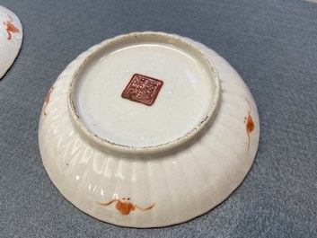 Seven Chinese famille rose saucers, a teapot and a covered box, 19th C.