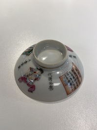 Une tasse couverte et soucoupe en porcelaine de Chine famille rose &agrave; d&eacute;cor 'Wu Shuang Pu', marque et &eacute;poque de Daoguang