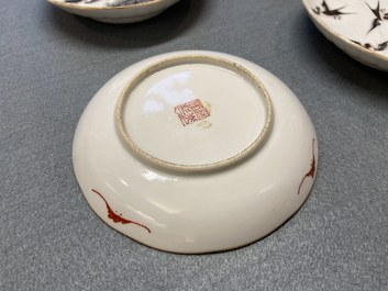 Seven Chinese famille rose saucers, a teapot and a covered box, 19th C.