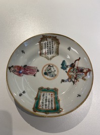 A Chinese famille rose 'Wu Shuang Pu' covered cup and saucer, Daoguang mark and of the period