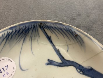 Two Chinese blue, white and copper-red 'fish' plates, Transitional period