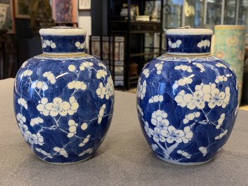 A pair of Chinese blue and white covered bowls on stands and a pair of covered jars, 19th C.