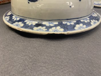 A pair of large Chinese blue and white covered vases, 19th C.