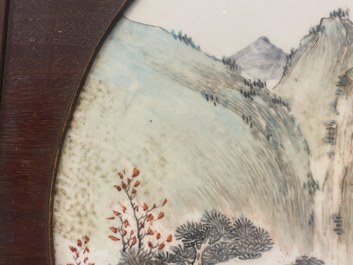 A round Chinese qianjiang cai 'landscape' plaque, signed Wang Shao Wei, 19th C.