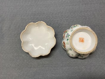 Seven Chinese famille rose saucers, a teapot and a covered box, 19th C.