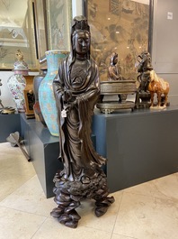 An exceptionally large Chinese silver-inlaid bronze figure of Guanyin, Yutang Shi Sou mark, Qing