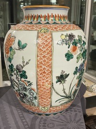 A pair of Chinese blue and white bowls and a famille verte vase, 19th C.